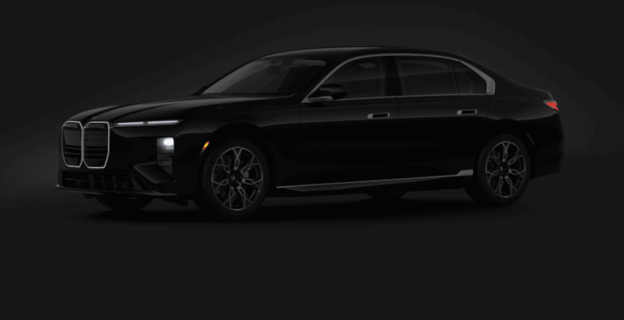 Black 2026 BMW 740i xDrive executive sedan